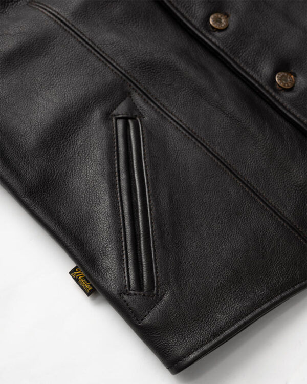 Hand stitched leather vest mauvetree